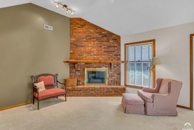Unique open floor plan.  Living room featuring a vaulted ceiling on Alvamar Country Club in Kansas - for sale on GolfHomes.com, golf home, golf lot