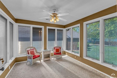 Unique open floor plan.  Living room featuring a vaulted ceiling on Alvamar Country Club in Kansas - for sale on GolfHomes.com, golf home, golf lot