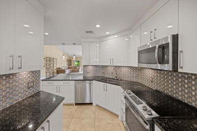 Tucked within the sought-after community of The Fountains, this on Fountains Golf and Country Club in Florida - for sale on GolfHomes.com, golf home, golf lot