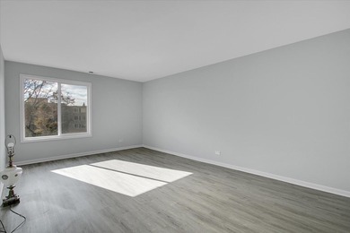 This beautifully updated 2-bed, 2-bath END-UNIT condo offers on Twin Lakes Golf Course in Illinois - for sale on GolfHomes.com, golf home, golf lot