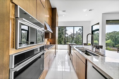 Modern luxury meets functional design in this stunning on Greystone Country Club in Arkansas - for sale on GolfHomes.com, golf home, golf lot