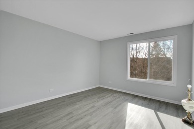 This beautifully updated 2-bed, 2-bath END-UNIT condo offers on Twin Lakes Golf Course in Illinois - for sale on GolfHomes.com, golf home, golf lot