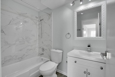 This beautifully updated 2-bed, 2-bath END-UNIT condo offers on Twin Lakes Golf Course in Illinois - for sale on GolfHomes.com, golf home, golf lot