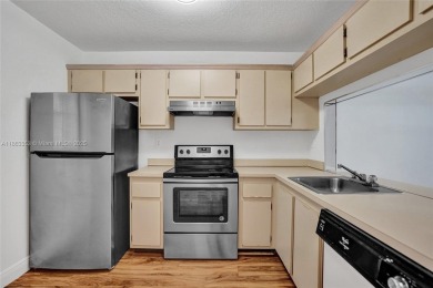 Come view this 2 bedroom 2 bathroom condo in the heart of on Pembroke Lakes Golf Club in Florida - for sale on GolfHomes.com, golf home, golf lot