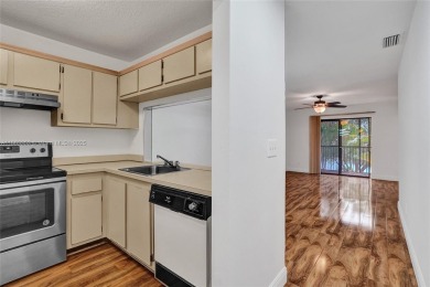 Come view this 2 bedroom 2 bathroom condo in the heart of on Pembroke Lakes Golf Club in Florida - for sale on GolfHomes.com, golf home, golf lot