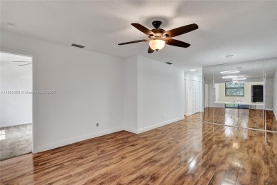 Come view this 2 bedroom 2 bathroom condo in the heart of on Pembroke Lakes Golf Club in Florida - for sale on GolfHomes.com, golf home, golf lot