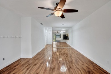 Come view this 2 bedroom 2 bathroom condo in the heart of on Pembroke Lakes Golf Club in Florida - for sale on GolfHomes.com, golf home, golf lot