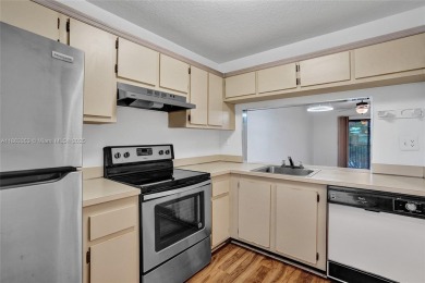 Come view this 2 bedroom 2 bathroom condo in the heart of on Pembroke Lakes Golf Club in Florida - for sale on GolfHomes.com, golf home, golf lot