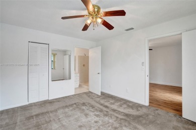 Come view this 2 bedroom 2 bathroom condo in the heart of on Pembroke Lakes Golf Club in Florida - for sale on GolfHomes.com, golf home, golf lot