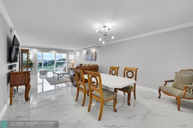 THIS BEAUTIFULLY REDESIGNED AND CRAFTED CONDO. It is a stunning on Wynmoor Golf Course in Florida - for sale on GolfHomes.com, golf home, golf lot