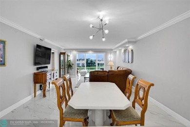 THIS BEAUTIFULLY REDESIGNED AND CRAFTED CONDO. It is a stunning on Wynmoor Golf Course in Florida - for sale on GolfHomes.com, golf home, golf lot