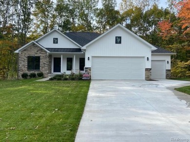 Welcome Home! Rare New Construction in Houghton Lake, MI located on Quest Golf Club in Michigan - for sale on GolfHomes.com, golf home, golf lot