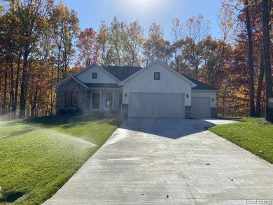 Welcome Home! Rare New Construction in Houghton Lake, MI located on Quest Golf Club in Michigan - for sale on GolfHomes.com, golf home, golf lot