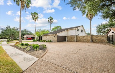 This stunning residence in Corpus Christi Country Club offers 4 on Corpus Christi Country Club Golf Course in Texas - for sale on GolfHomes.com, golf home, golf lot