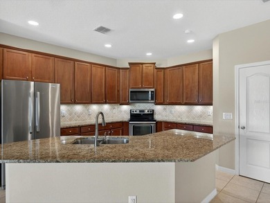 Waterfront home in Shingle Creek Reserve, where Florida living on Oaks National Golf Course in Florida - for sale on GolfHomes.com, golf home, golf lot