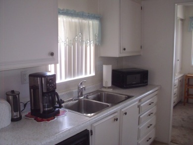 This 1973 Manufactured home is in a quite cul-sac with a large on The Club At Shenandoah Springs in California - for sale on GolfHomes.com, golf home, golf lot
