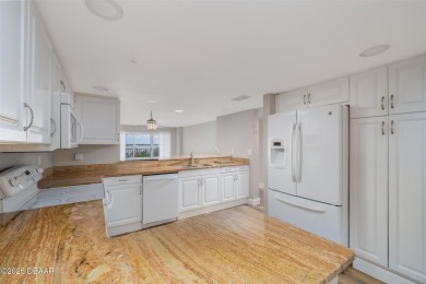 Welcome to your perfect coastal getaway! This spacious 3-bedroom on Oceans Golf Club in Florida - for sale on GolfHomes.com, golf home, golf lot