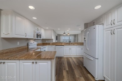 Welcome to your perfect coastal getaway! This spacious 3-bedroom on Oceans Golf Club in Florida - for sale on GolfHomes.com, golf home, golf lot