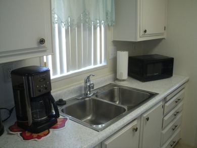 This 1973 Manufactured home is in a quite cul-sac with a large on The Club At Shenandoah Springs in California - for sale on GolfHomes.com, golf home, golf lot
