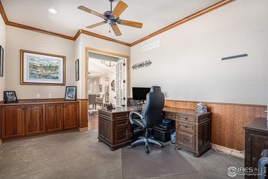Discover quiet luxury in this exceptional ranch home, situated on Colorado National Golf Club in Colorado - for sale on GolfHomes.com, golf home, golf lot