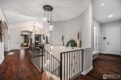 Discover quiet luxury in this exceptional ranch home, situated on Colorado National Golf Club in Colorado - for sale on GolfHomes.com, golf home, golf lot