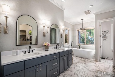 Discover quiet luxury in this exceptional ranch home, situated on Colorado National Golf Club in Colorado - for sale on GolfHomes.com, golf home, golf lot