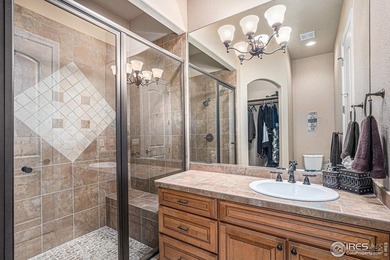 Discover quiet luxury in this exceptional ranch home, situated on Colorado National Golf Club in Colorado - for sale on GolfHomes.com, golf home, golf lot