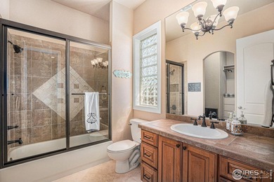 Discover quiet luxury in this exceptional ranch home, situated on Colorado National Golf Club in Colorado - for sale on GolfHomes.com, golf home, golf lot