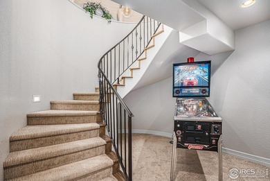 Discover quiet luxury in this exceptional ranch home, situated on Colorado National Golf Club in Colorado - for sale on GolfHomes.com, golf home, golf lot