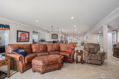 Discover quiet luxury in this exceptional ranch home, situated on Colorado National Golf Club in Colorado - for sale on GolfHomes.com, golf home, golf lot