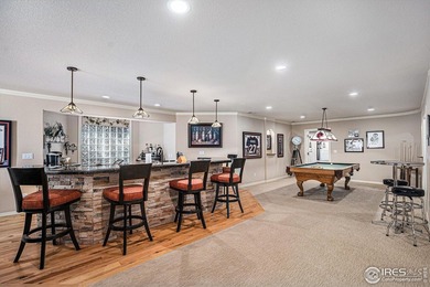 Discover quiet luxury in this exceptional ranch home, situated on Colorado National Golf Club in Colorado - for sale on GolfHomes.com, golf home, golf lot