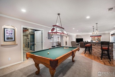 Discover quiet luxury in this exceptional ranch home, situated on Colorado National Golf Club in Colorado - for sale on GolfHomes.com, golf home, golf lot