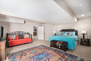 Discover quiet luxury in this exceptional ranch home, situated on Colorado National Golf Club in Colorado - for sale on GolfHomes.com, golf home, golf lot