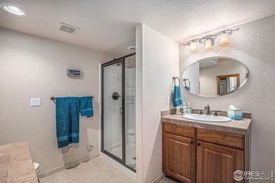 Discover quiet luxury in this exceptional ranch home, situated on Colorado National Golf Club in Colorado - for sale on GolfHomes.com, golf home, golf lot