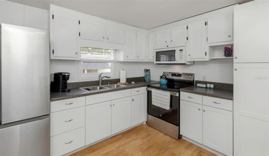 This adorable home has been meticulously and lovingly maintained on Fairway Village Golf Course in Florida - for sale on GolfHomes.com, golf home, golf lot