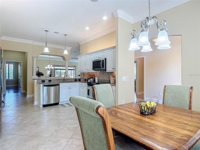 Beautifully maintained 3-bedroom, 2-bath NATCHEZ PREMIER model on The Links of Spruce Creek in Florida - for sale on GolfHomes.com, golf home, golf lot