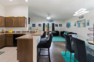 Welcome to your New Home! This stunning 5-bedroom, 2-bath home on Indian Lake Estates Golf and Country Club in Florida - for sale on GolfHomes.com, golf home, golf lot