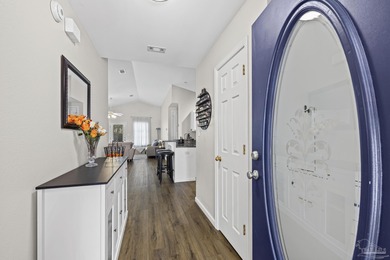 Welcome home to this beautifully updated Gulf Breeze gem, tucked on Tiger Point Golf and Country Club in Florida - for sale on GolfHomes.com, golf home, golf lot