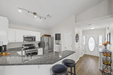 Welcome home to this beautifully updated Gulf Breeze gem, tucked on Tiger Point Golf and Country Club in Florida - for sale on GolfHomes.com, golf home, golf lot