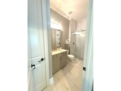 Must see, stunning custom home cradled in the sought after gated on Manor Golf and Country Club in Georgia - for sale on GolfHomes.com, golf home, golf lot