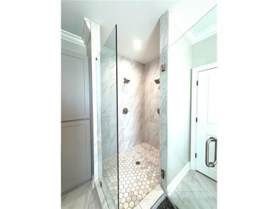 Must see, stunning custom home cradled in the sought after gated on Manor Golf and Country Club in Georgia - for sale on GolfHomes.com, golf home, golf lot