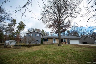 This captivating home on the bluff in Gladstone, located under on Terrace Bluff Golf Course in Michigan - for sale on GolfHomes.com, golf home, golf lot