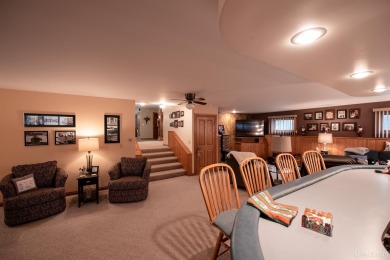 This captivating home on the bluff in Gladstone, located under on Terrace Bluff Golf Course in Michigan - for sale on GolfHomes.com, golf home, golf lot