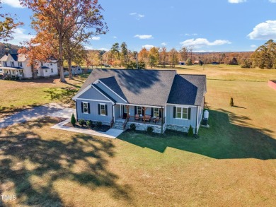 This beautifully UPGRADED like-new home on an acre lot is only on Kerr Lake Country Club in North Carolina - for sale on GolfHomes.com, golf home, golf lot