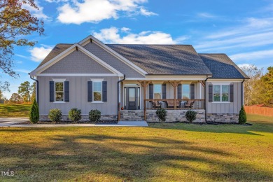 This beautifully UPGRADED like-new home on an acre lot is only on Kerr Lake Country Club in North Carolina - for sale on GolfHomes.com, golf home, golf lot