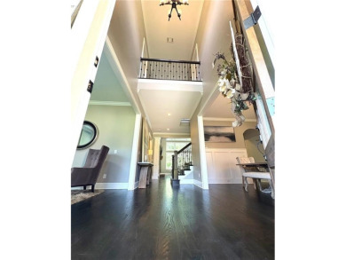 Must see, stunning custom home cradled in the sought after gated on Manor Golf and Country Club in Georgia - for sale on GolfHomes.com, golf home, golf lot