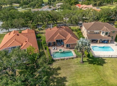 Exquisite Renovated Home in Prestigious Gated Golf Community

 on Bayou Golf Club in Florida - for sale on GolfHomes.com, golf home, golf lot