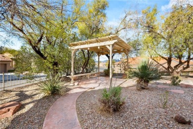 Location, location, location! Just a short cart path drive to on Highland Falls Golf Club in Nevada - for sale on GolfHomes.com, golf home, golf lot