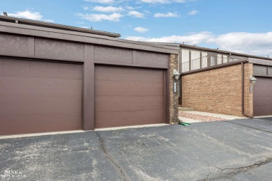 Lovely end unit ranch with views of the pond and pier in this on St. Clair Shores Country Club in Michigan - for sale on GolfHomes.com, golf home, golf lot