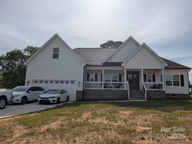 Fabulous golf course home featuring impressive vaulted ceiling on Woodbridge Golf Links in North Carolina - for sale on GolfHomes.com, golf home, golf lot